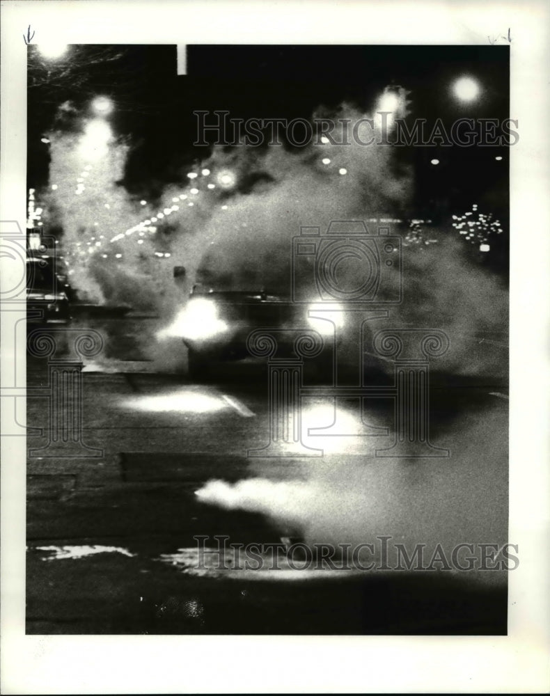 1982 Press Photo The steam from the manhole covers in front of Ohio Plaza - Historic Images