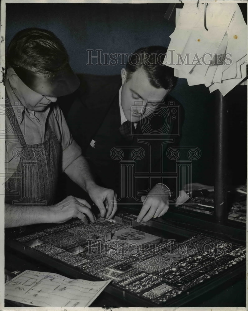 1941 Press Photo News Editor John Mullaney hovers over page one - cva66072 - Historic Images