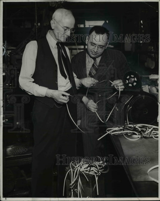 1941 Press Photo Associated Press ticker tape carries right into the News room - Historic Images