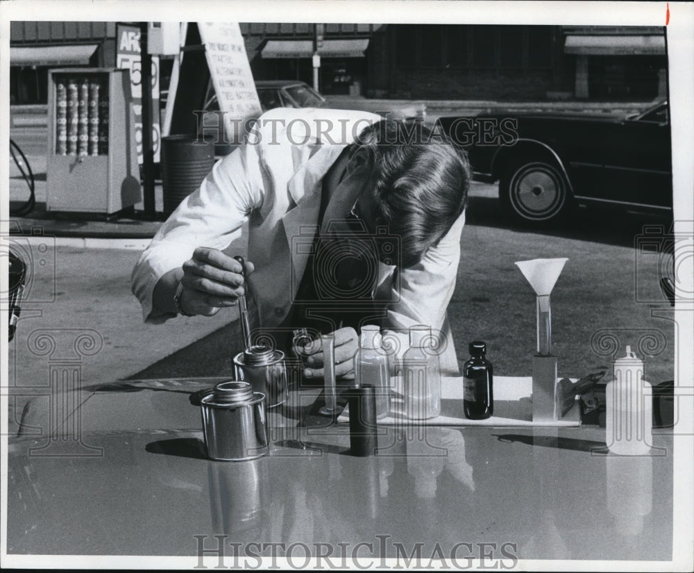 1974, The testing of unleaded gas by Paul de Percin - Historic Images