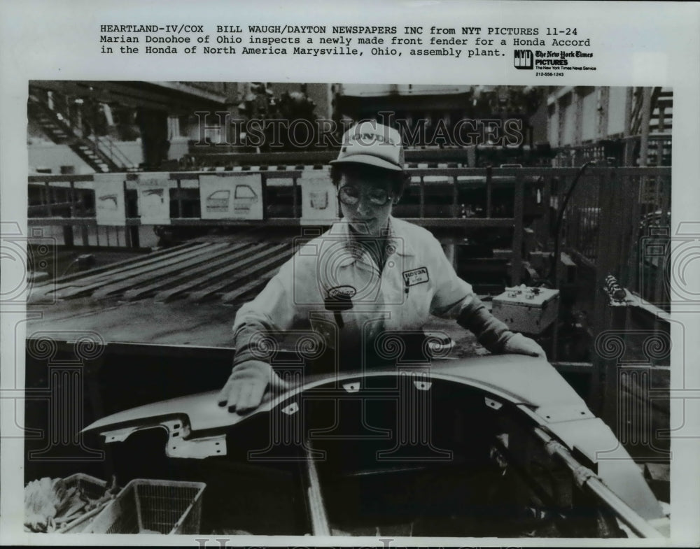 1983 Press Photo Marian Donohoe inspects the newly made front fender for Accord - Historic Images