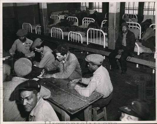 1953, Small idle room at workhouse used for sleeping quarters at - Historic Images