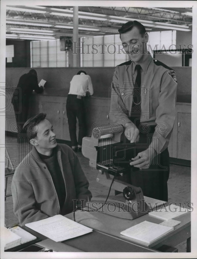 1963 Press Photo Higway Patrolman George Lang preparing Driver testing. - Historic Images