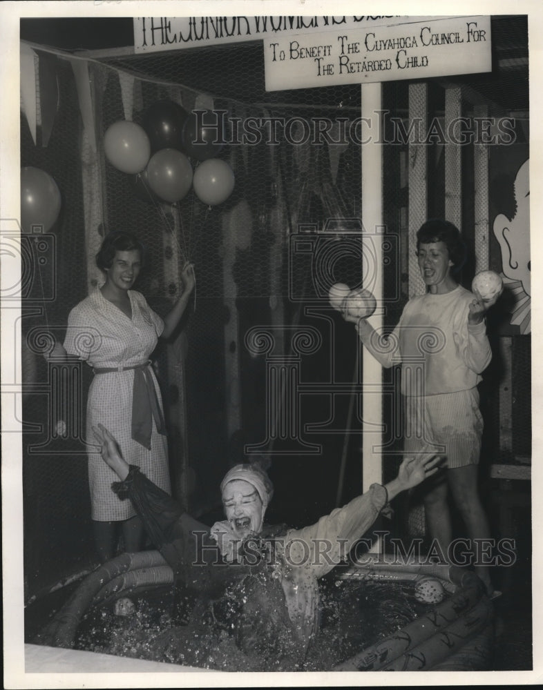 1962 Press Photo A clown hits the water part of the lively game offered by the - Historic Images