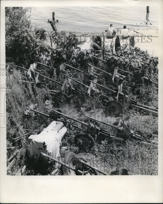 1964 The used fire arms left overs of the World Wars I and II - Historic Images