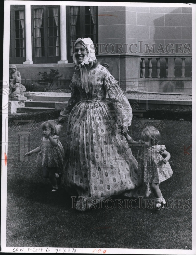 1970 Susan Harvey wears a printed lawn day dress from 1840s era - Historic Images