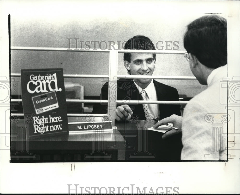 1988 Press Photo Society Bank teller Mike Lipcrey - Historic Images