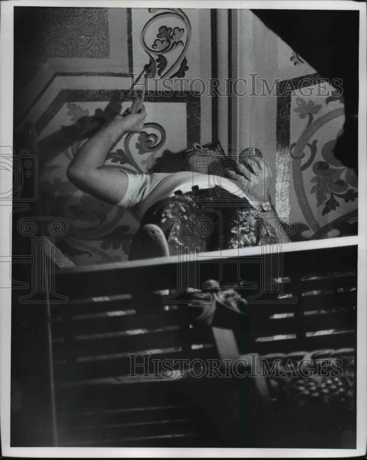 1972 Man painting scrollwork St John's Cathedral Renovation - Historic Images