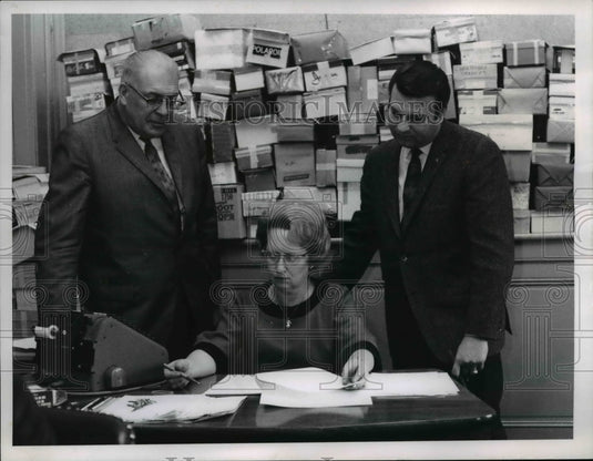 1968 J E.O"Meara and E F.Mag Check Early Results with Mrs. O"Donnell - Historic Images