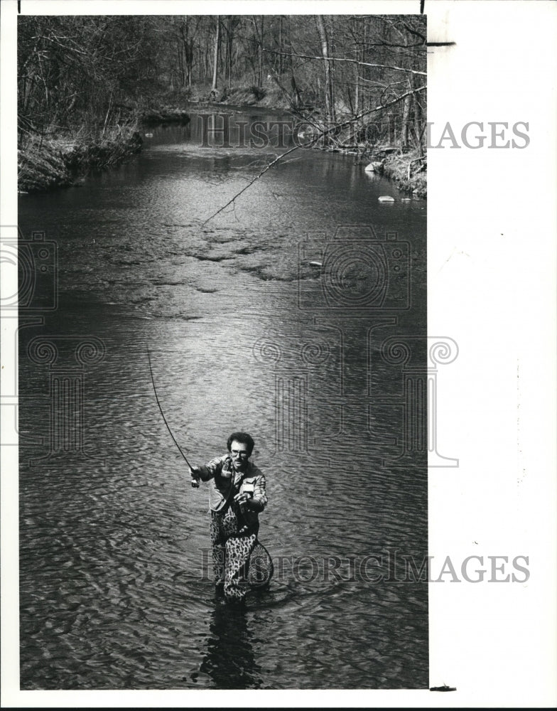 1989 Press Photo Michael Squirek fishing for Trout at Rocky River Reservation - Historic Images