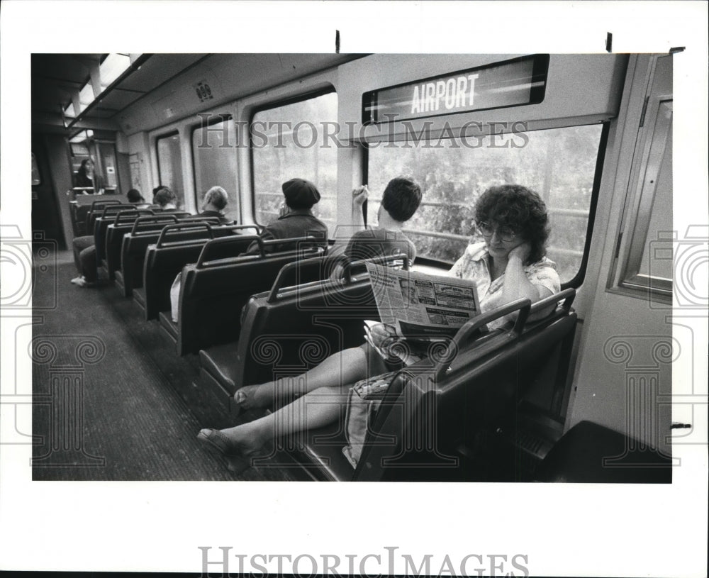 1987 Press Photo JoAnn DiCarlo at the west bound Rapid Transit car - Historic Images