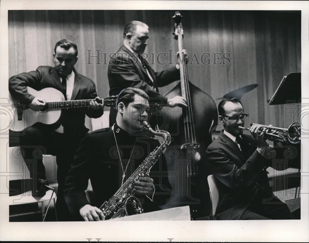 1966 Capt. Edward V. Diamond, with saxophone  - Historic Images