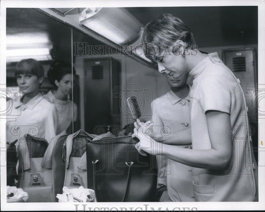 1966 Halle inspecting product at Halle Bros. Co. factory  - Historic Images