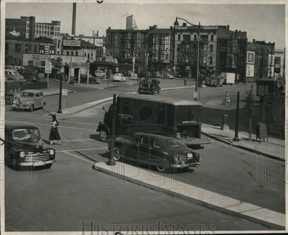 1948 Press Photo City dresses up E14th, concrete island added on Payne &amp; Chester - Historic Images