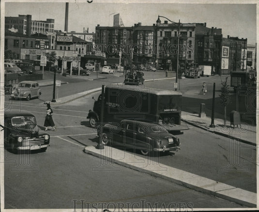 1948 Press Photo City dresses up E14th, concrete island added on Payne & Chester - Historic Images
