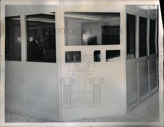 1965 Press Photo Chief Deputy George Papadopulos (seen through windows) operates - Historic Images