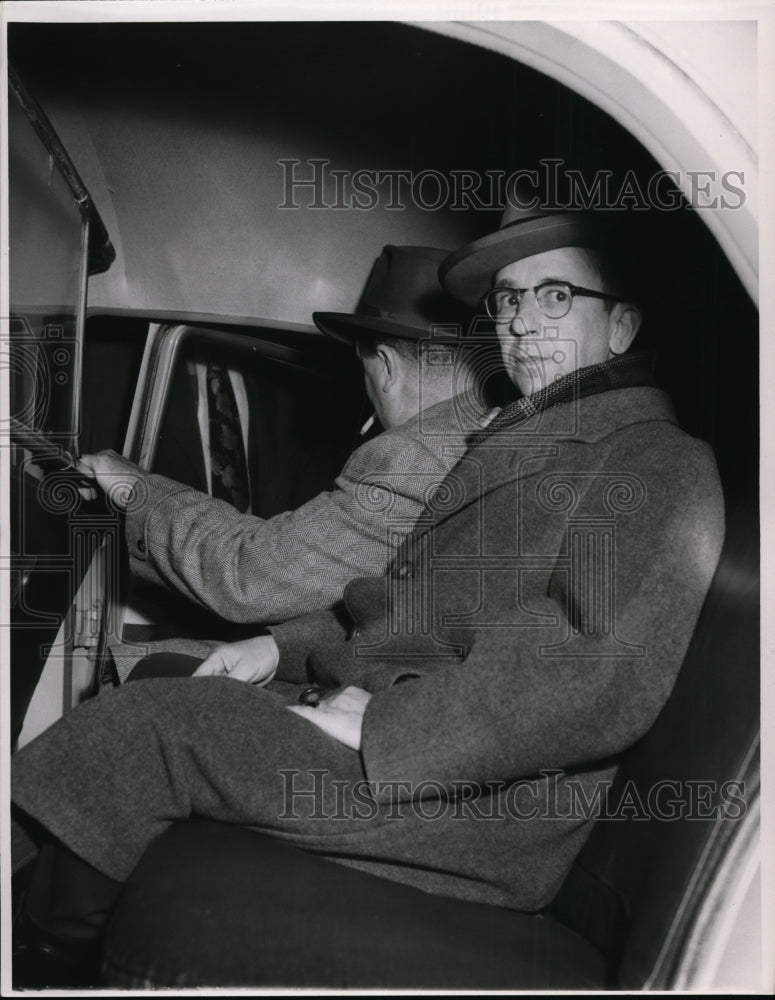 1954 Press Photo James C Bird Jury foreman being escorted in a vehicle-Historic Images