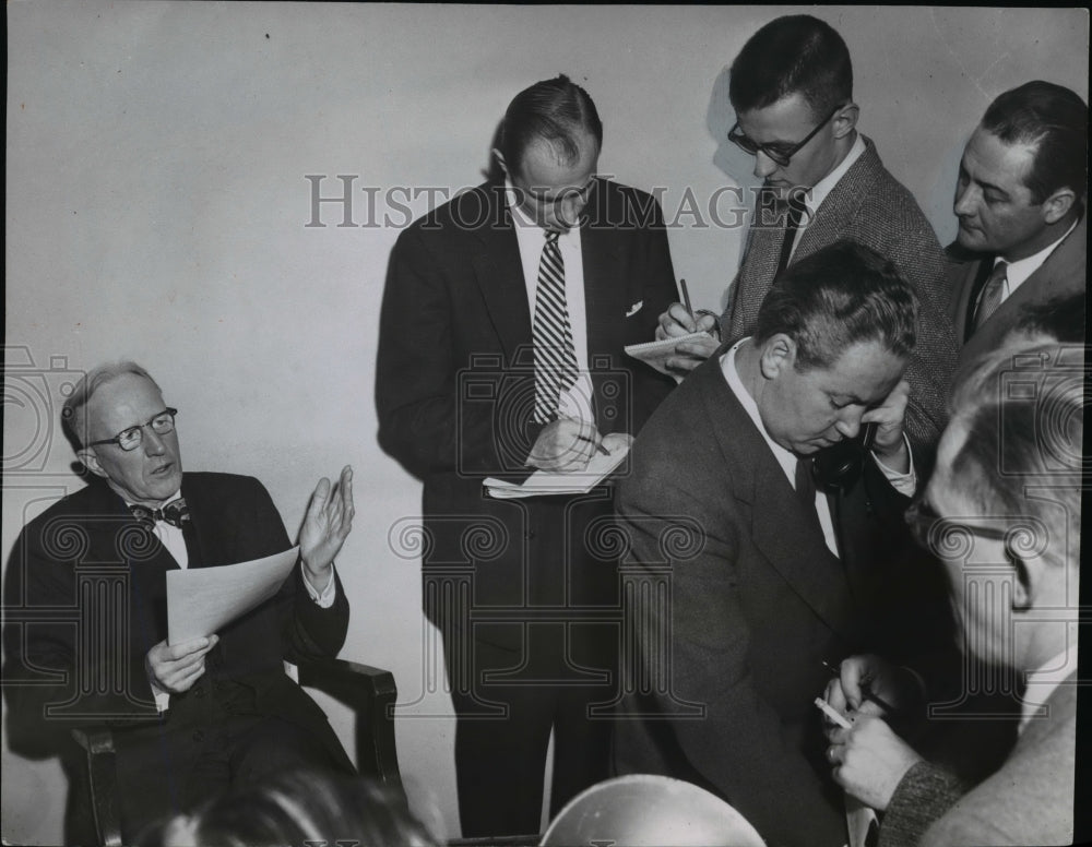 1954, Cornered by reporters common pleas Judge Edward Bythin - Historic Images