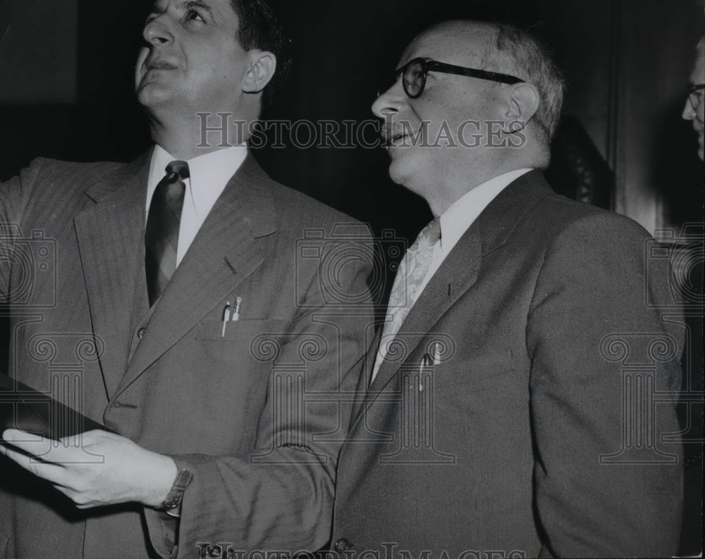 1954, Tom Parrino & Saul Dannsean looking at Xray of Dr. Sam's neck. - Historic Images