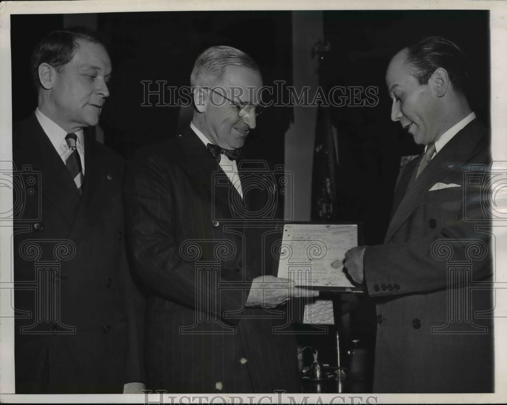 1946, Truman receives manuscript of Famous War Song-Frank Loesser - Historic Images