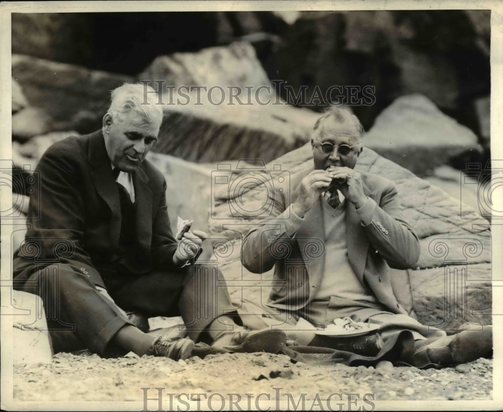 1936 Press Photo Men Biting Dogs - cvb07774-Historic Images