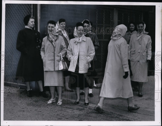 1961, Pickets at GE's struck lamp plant sneering at a line crosser - Historic Images