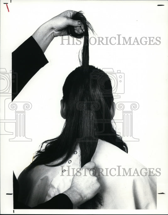 1990 Press Photo Hair Tyled into a Bow - cvb09897 - Historic Images