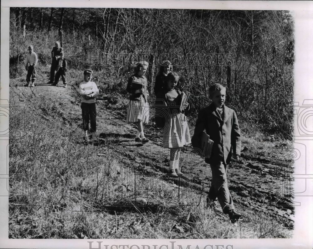 1960, There&#39;s only one way for pupils to get to Little Bullskin- walk - Historic Images