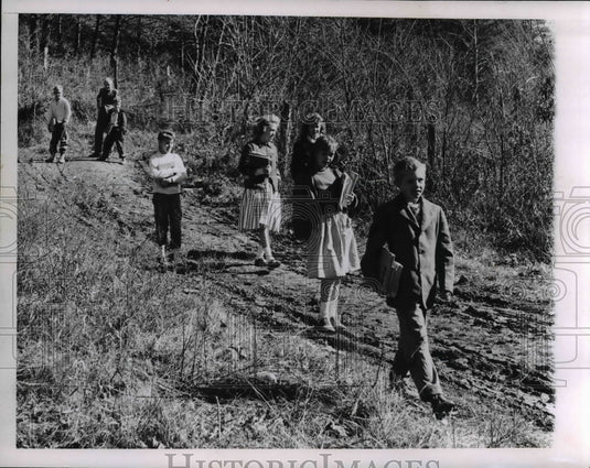 1960, There's only one way for pupils to get to Little Bullskin- walk - Historic Images