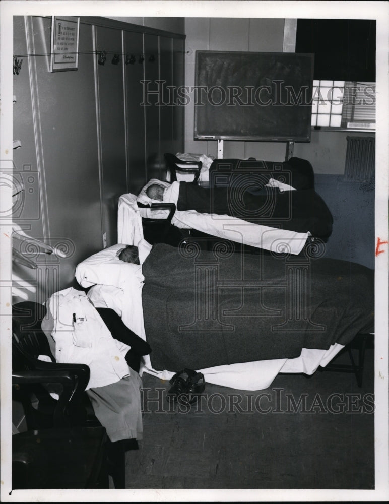 1957 CEI personnel locked in sleep in offices-Historic Images