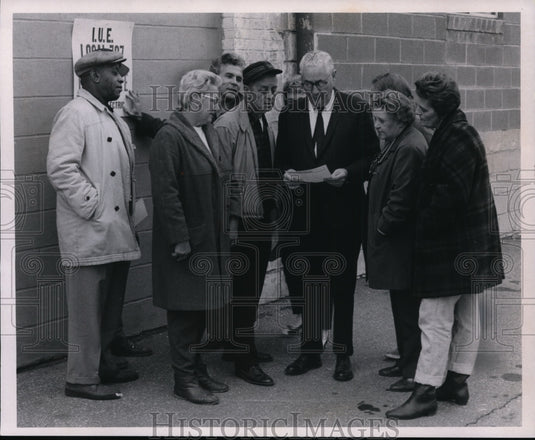 1969, Richard M. Evans talks to pickets at General Electric Strike - Historic Images