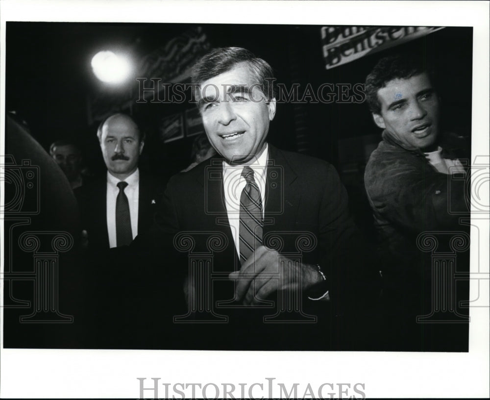 1988, Presidential hopeful Michael Dukakis arrives at the UAW Hall - Historic Images