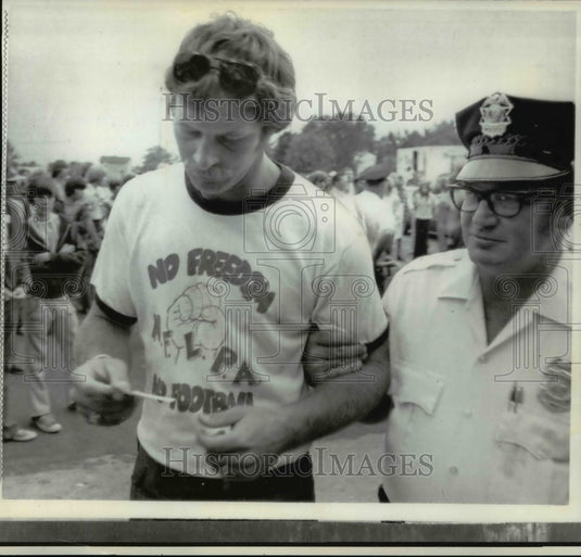 1974 Bears' Mac Percival being taken into custody for picketing-Historic Images