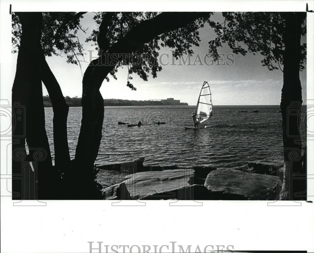 1987, Geno Adams of Cleveland wind surfs at Edgewater Park - Historic Images