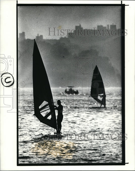 1989 Press Photo Windsurfers in early evening at Edgewater Park - cvb18540 - Historic Images