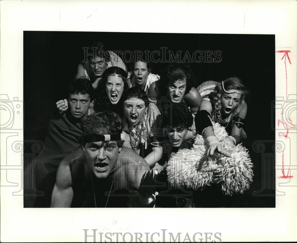 1980 Press Photo Cast of Betawulf charging at audience as part of the show - Historic Images