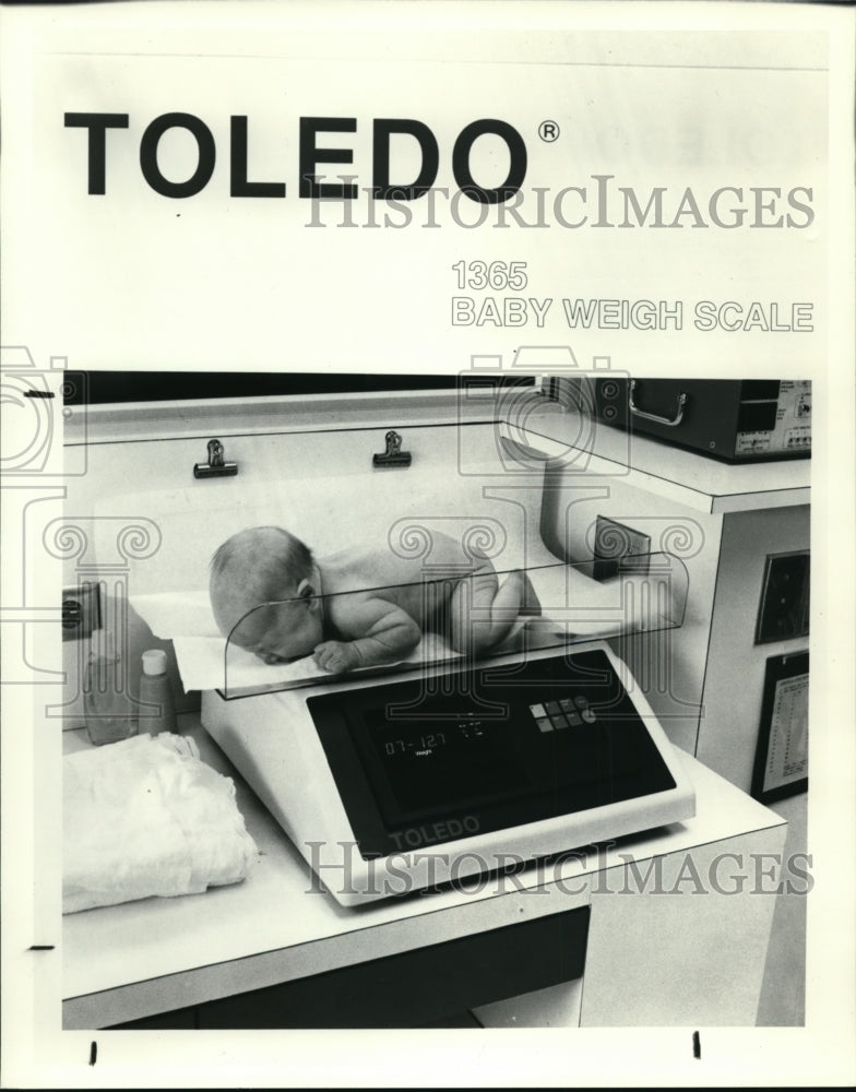 1988 Press Photo Toledo 1365 Baby Weigh Scale - cvb26610 - Historic Images