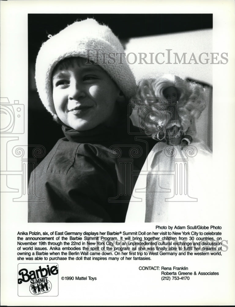 1990 Press Photo Anika Polzin, 6 of East Germany displays her Barbie Summit Doll - Historic Images