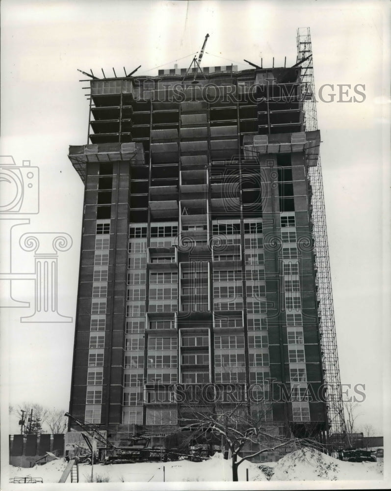 1964 Construction continues uninterrupted by snow on Crystal Tower-Historic Images