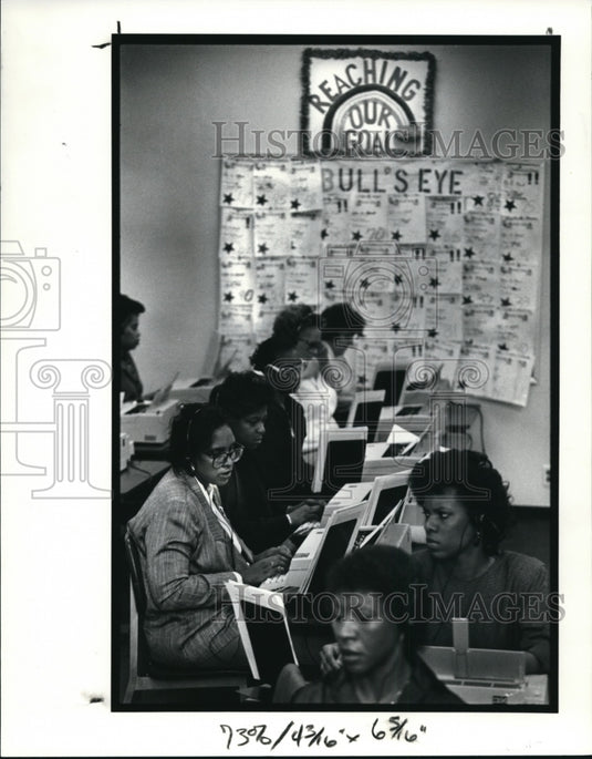 1990, Women practice their typing skills during a class at Cleveland - Historic Images