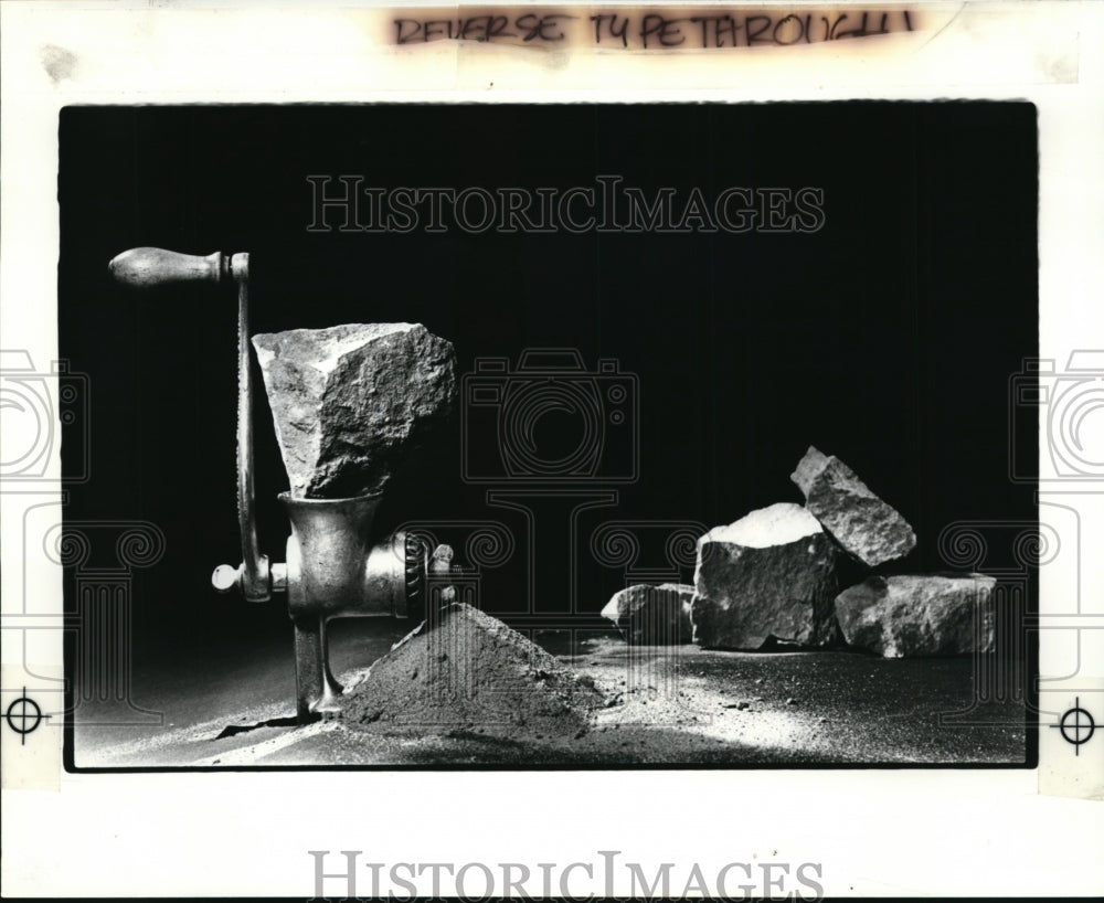 1984 Press Photo Grinding Rocks Into Sand Illustration - cvb29947 - Historic Images