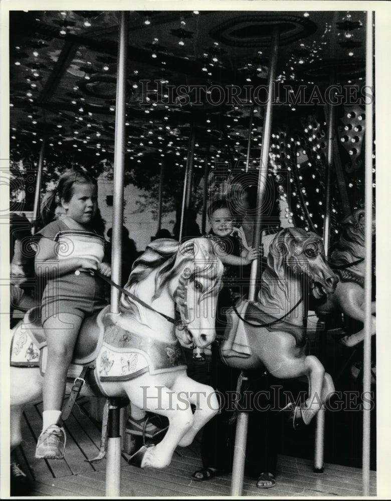 1979 Press Photo Children Riding Carousel at the Cuyahoga County Fair - Historic Images