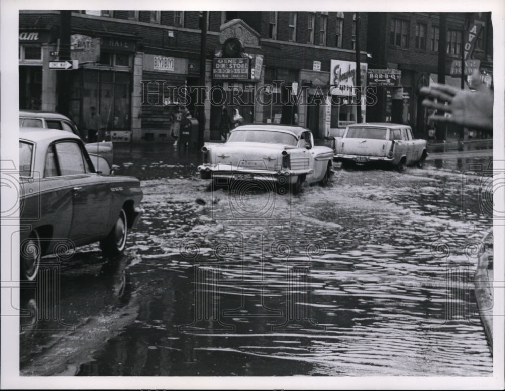 1964, Flooding at E77 & Hough Streets after heavy rainfall, Cleveland - Historic Images