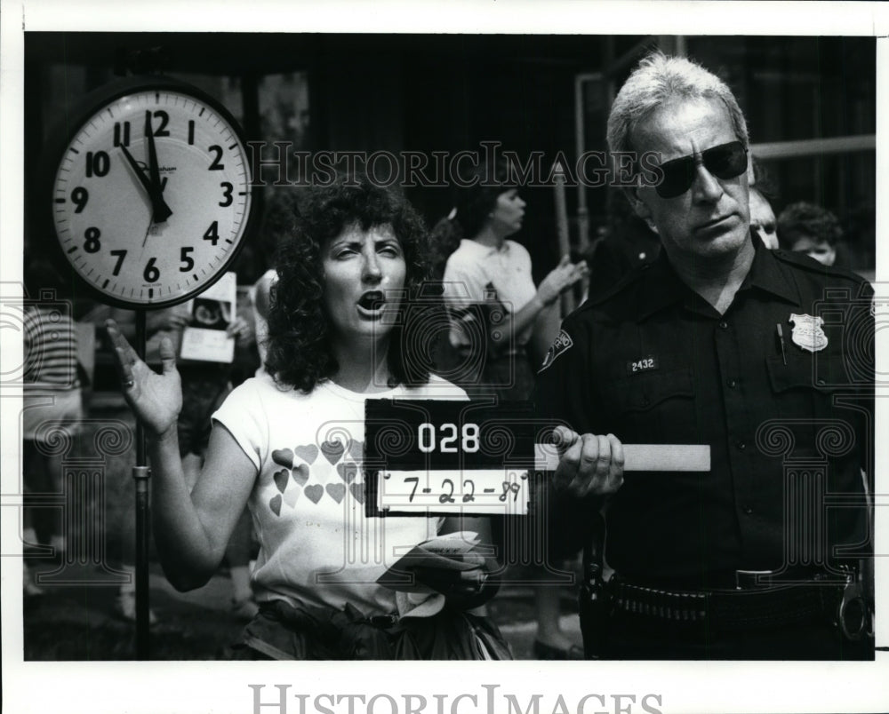 1989 Press Photo An abortion protester as she&#39;s being arrested for trespassing - Historic Images