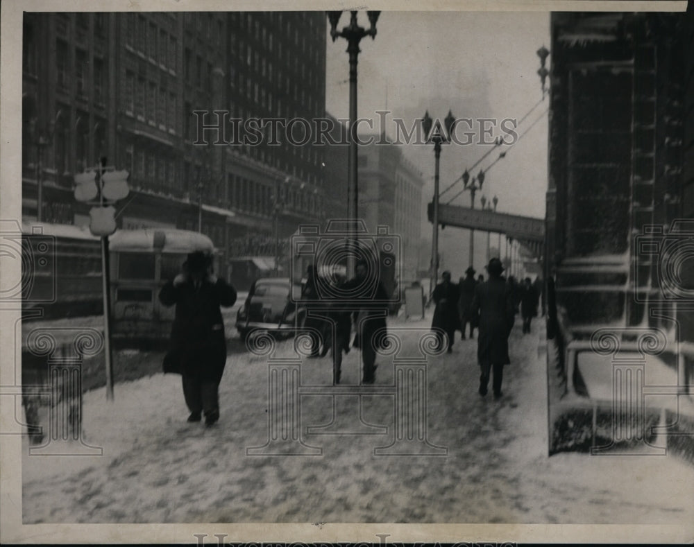 1947, Pedestrian of E 9th and Euclid in a cold weather - cvb33771 - Historic Images