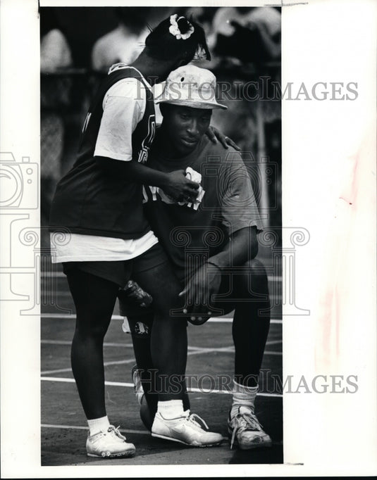 1991 Press Photo Tori Isom-Oberlin Track team and Sam Dyson of Men's track - Historic Images