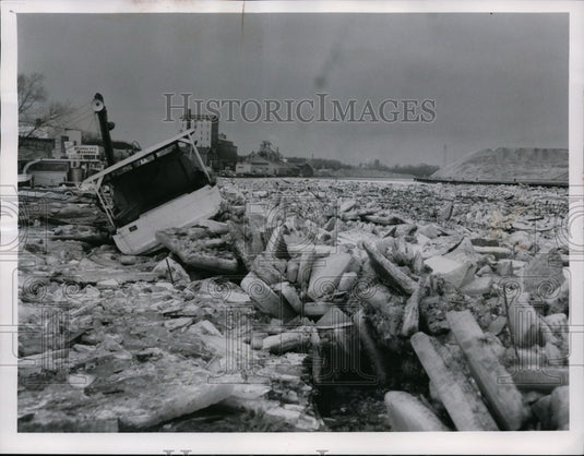 1961 Ice jams against a boat moored along the Grand River-Historic Images