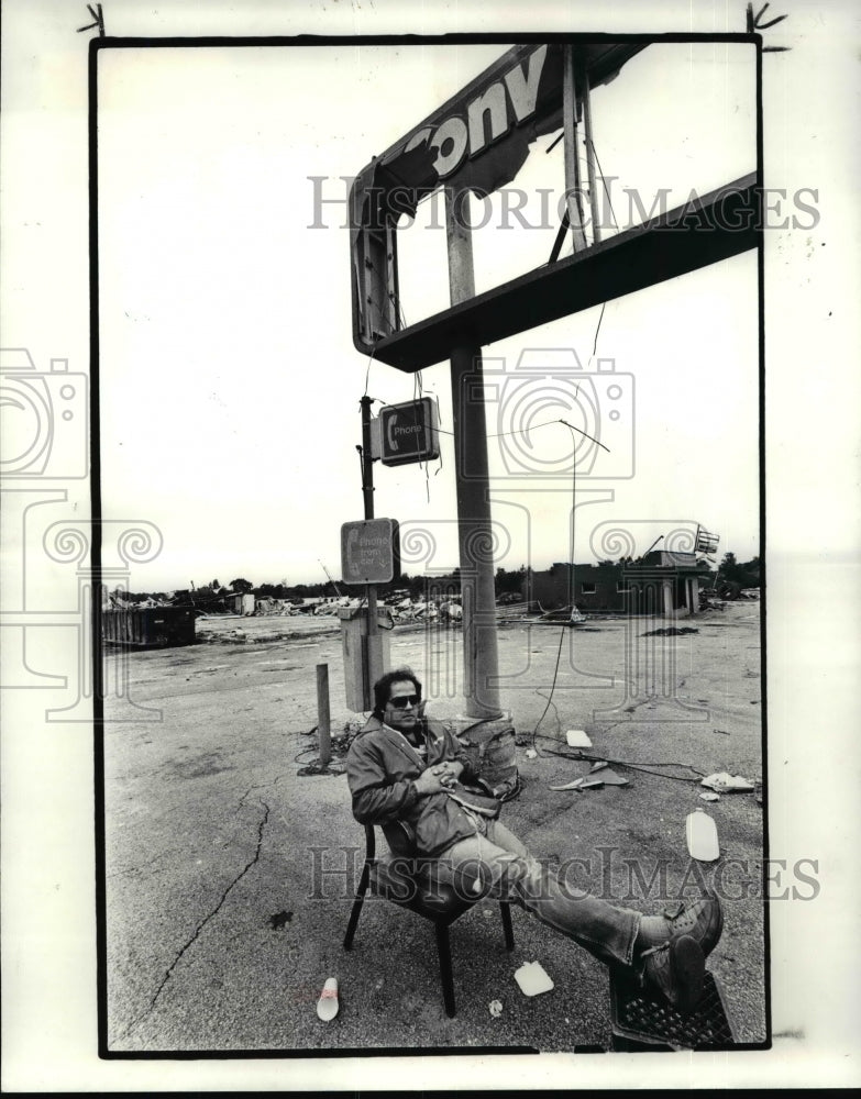 1985, OV Convient Store, Owner John Amzen after struck by tornado - Historic Images