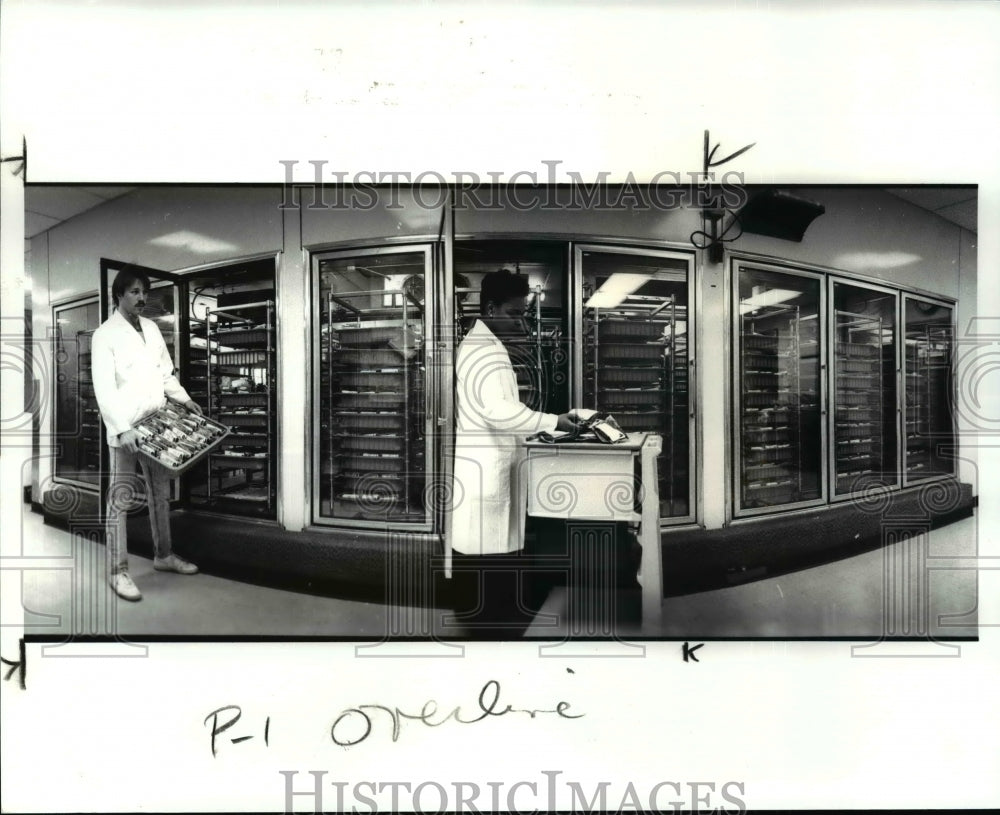 1987 Press Photo Red Cross Employees Inventory Blood Supplies - cvb36398 - Historic Images