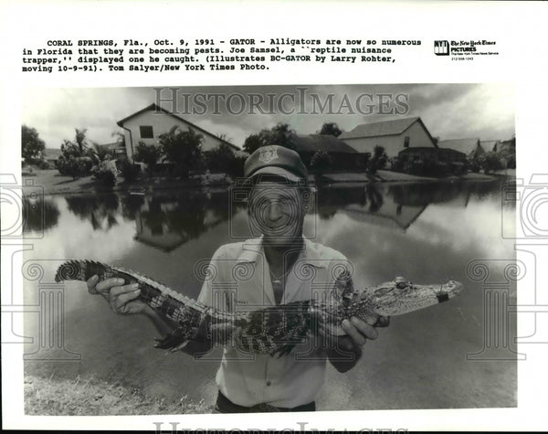 1991 Press Photo Joe Samsel, a reptile nuisance trapper. Alligators in ...